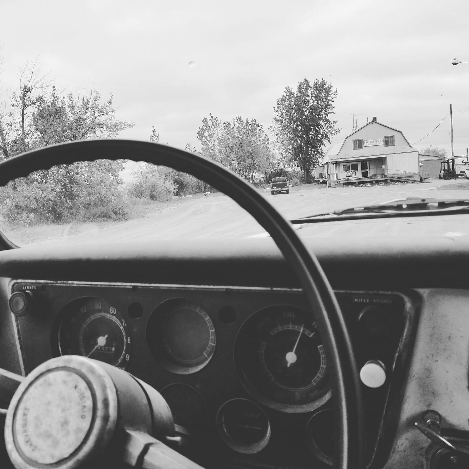 A Black and White picture from the Old Chevy Net Truck on the way to mend nets
